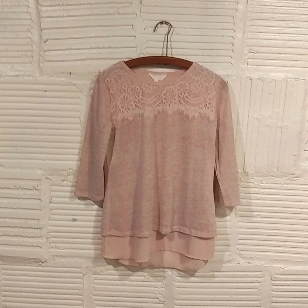 Adiva size small 2 layer top with open detail in the backWelcome to Poshmark.